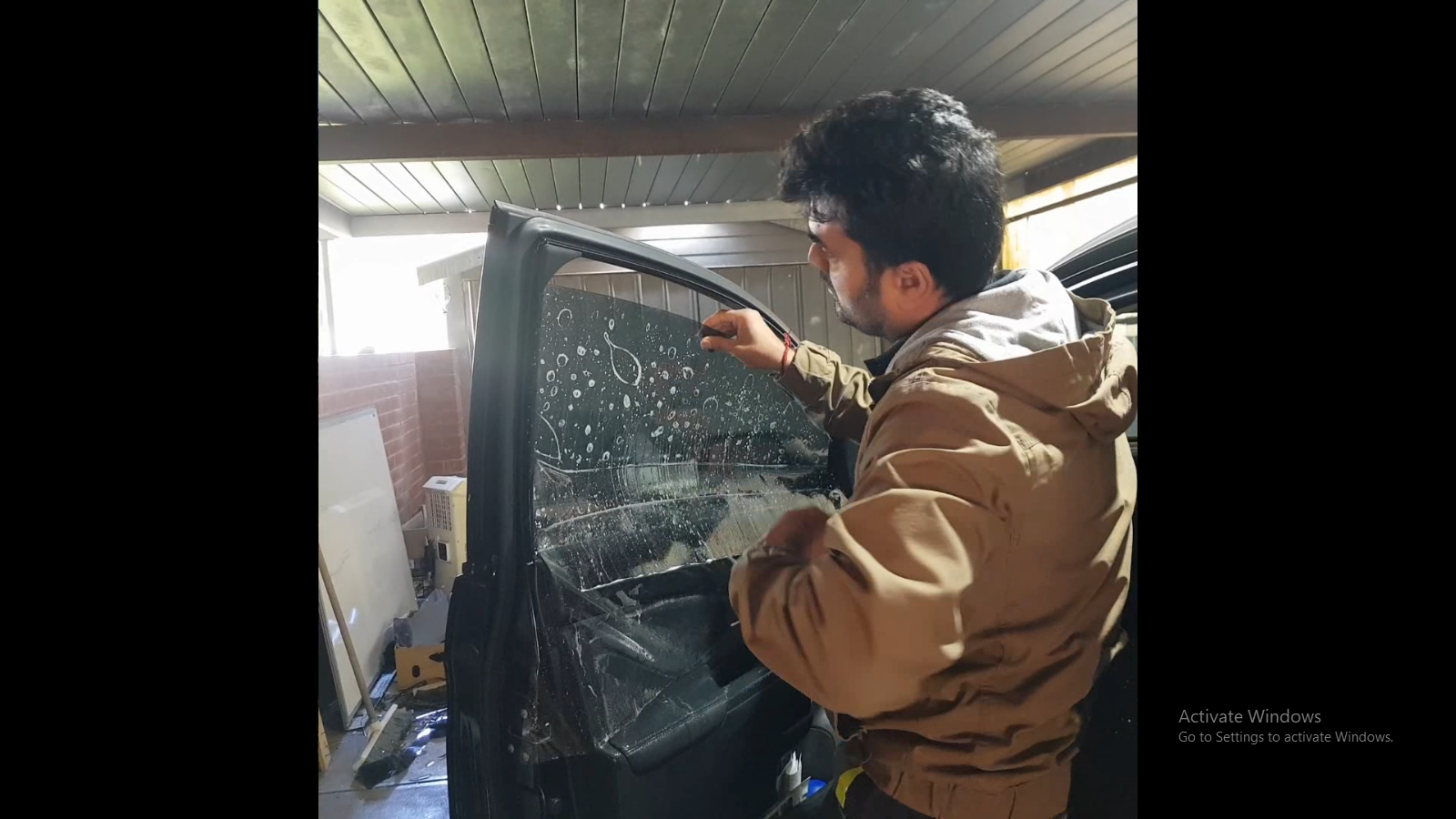 Jignesh Shah — tinting a car professionally